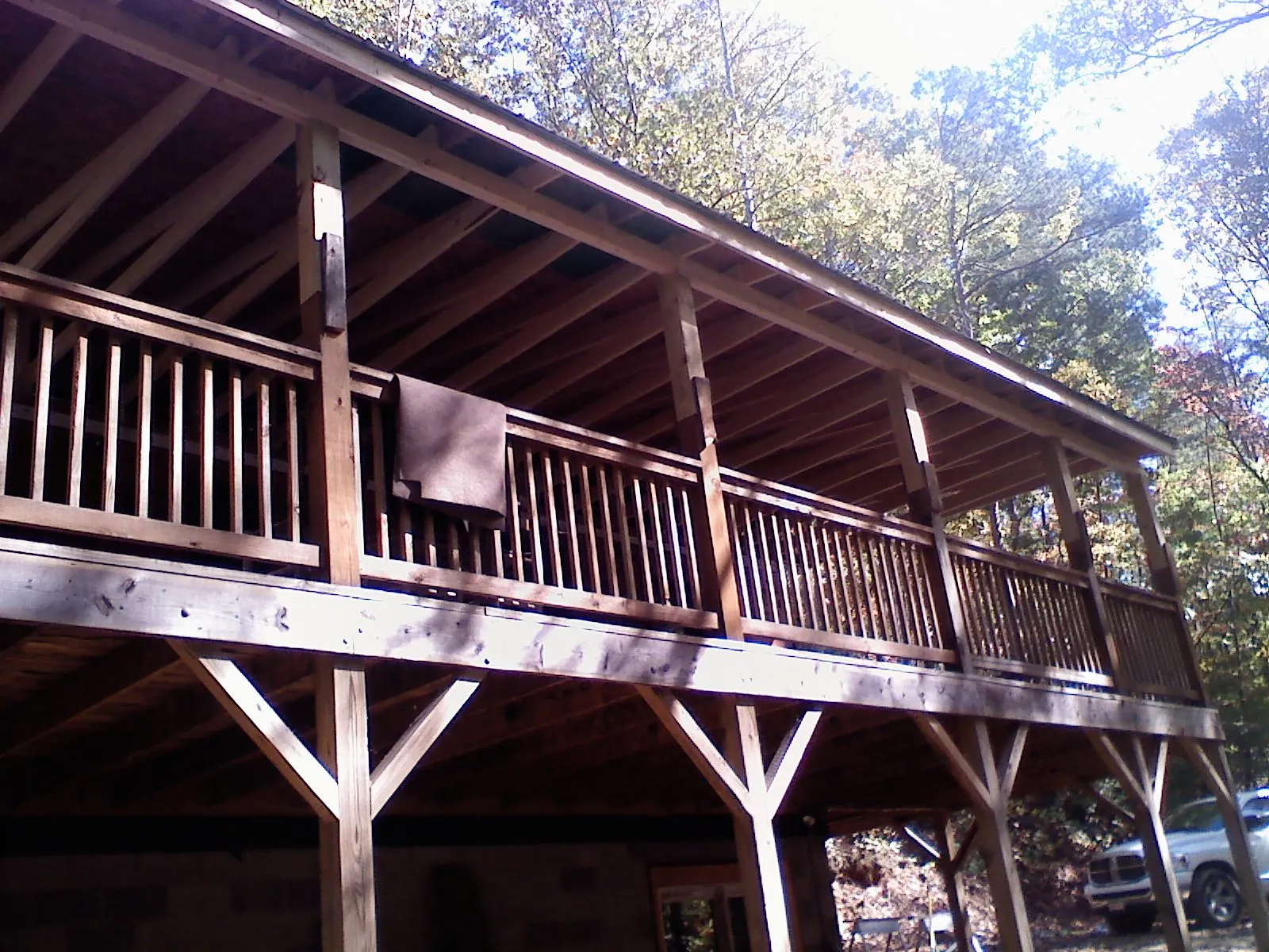 Timber framing under a new elevated porch and deck — Roof Leak Repair in Farnhamville by Roofing Brothers